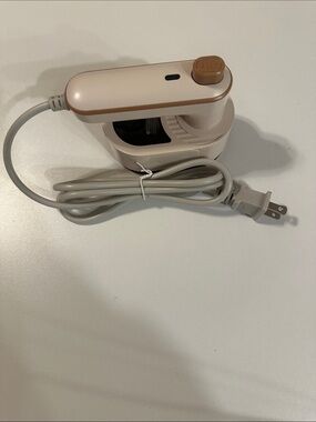 Portable mini Ironing machine for travel.